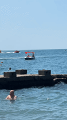 Crowded summer beach day on Sochi's Black Sea coast