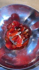 Strawberry preparation documented in Kiel kitchen Monday evening