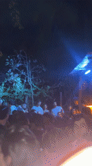 Early morning bar scene and outdoor gathering in Puerto Escondido