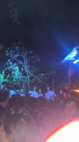 Early morning bar scene and outdoor gathering in Puerto Escondido