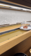 Conveyor belt sushi documented at Seoul restaurant