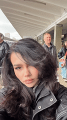 Woman takes selfie at Moscow train station