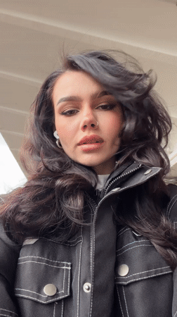 Woman takes selfie at Moscow train station