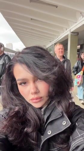 Woman takes selfie at Moscow train station