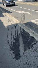 Street stain documented on Moscow asphalt pavement
