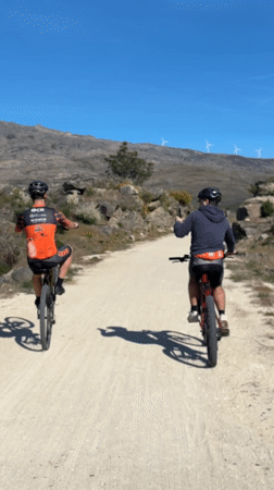 Mountain bikers perform stunts on Portuguese dirt roads
