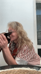 Woman with Siamese cat captured in early morning Ramat Gan