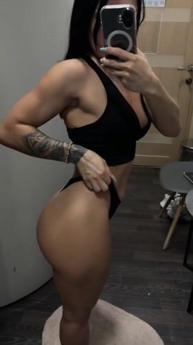Mirror selfies in a Ufa changing room, athletic wear and tattoos