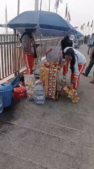 Morning market hustle along Jambi's riverside in late August