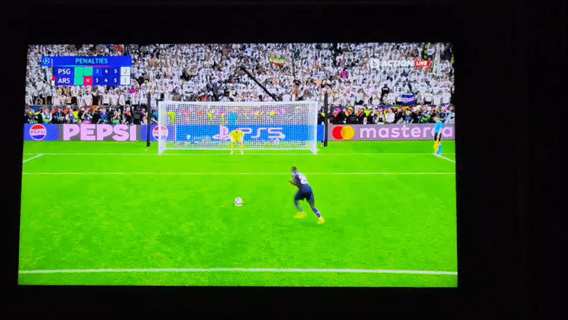 Sofia resident watches PSG-Arsenal penalty shootout on TV