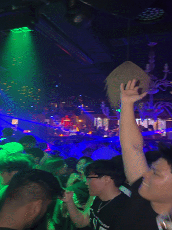 Nightclub scene with colorful lights captured in Xuanwu District