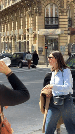 Ordinary Paris street life captured during sunny afternoon
