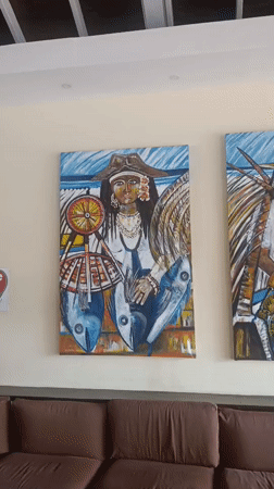 Tourist documents resort scenes in Porlamar, Venezuela
