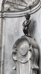 Tourist documents Brussels landmarks and street scenes over 10 minutes