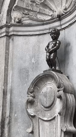 Tourist documents Brussels landmarks and street scenes over 10 minutes