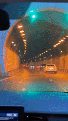 Motorist travels through lit tunnel in Sochi, Russia