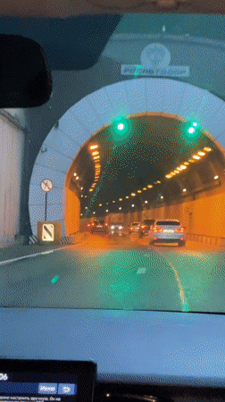 Motorist travels through lit tunnel in Sochi, Russia