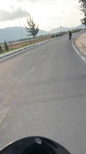 Morning highway travel documented in Nam Nha Trang Ward