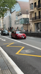 Flag-decorated vehicles parade through San Sebastián streets