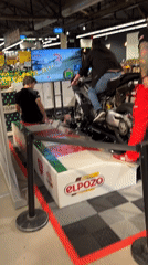 Motorcycle simulator spotted operating inside Barcelona supermarket
