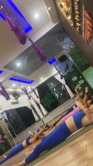 Yoga class in relaxation pose at Nha Trang studio