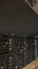 Nighttime apartment building views documented across Krasnodar residential district