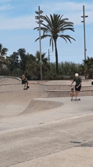 Barcelona residents enjoy outdoor activities on sunny afternoon