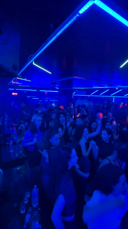 Live percussion performance draws crowds to neon-lit Paris venue