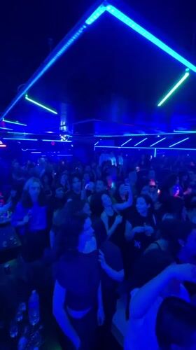 Live percussion performance draws crowds to neon-lit Paris venue