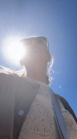 Woman enjoys sunny morning amid Mediterranean scenery in Kumbor