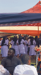 Coordinated outdoor celebration captured in Jos, Nigeria