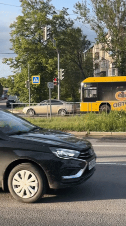 Fire truck, bus travel through Rusanovo as residents document street