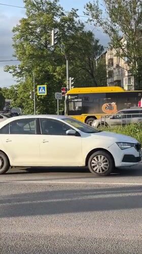 Fire truck, bus travel through Rusanovo as residents document street