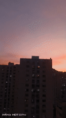 Caracas residents document sunset cityscape on May 12