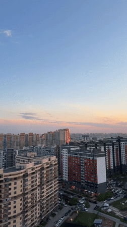 Sunset captured over Kudrovo residential skyline May 16