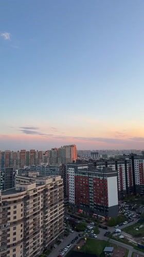 Sunset captured over Kudrovo residential skyline May 16