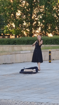 Violin busking and street life near Warsaw's historic centre