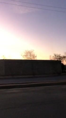 Sunset captured over Altagracia, Venezuela streets and hills