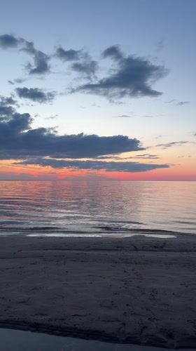 Dusk beach scene captured in Garupe, Latvia
