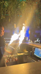 Flaming bar performance at a Lermontovo beach venue