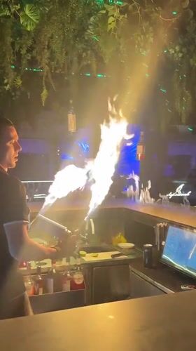 Flaming bar performance at a Lermontovo beach venue