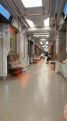 Urban nighttime scenes: subway car, street sign, apartment building