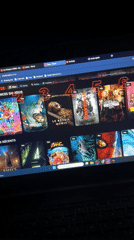 Person browses Movix movie website in Saint-Leu-d'Esserent, France