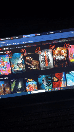 Person browses Movix movie website in Saint-Leu-d'Esserent, France