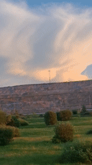 Sunset over an industrial slag heap outside Achinsk, Russia