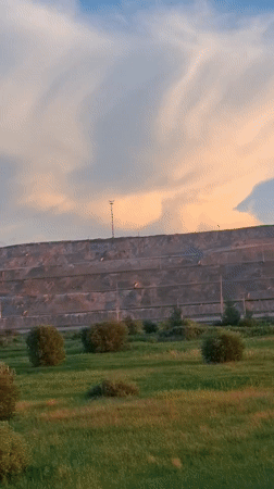 Sunset over an industrial slag heap outside Achinsk, Russia