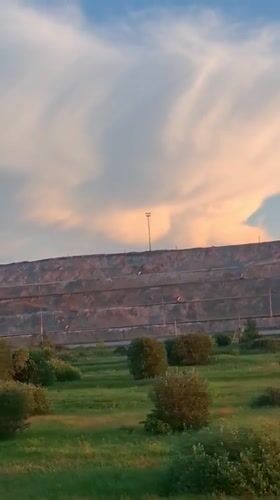 Sunset over an industrial slag heap outside Achinsk, Russia
