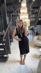 Woman takes selfies in luxury Moscow area interior