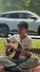 Informal music session in Astana park features traditional instruments