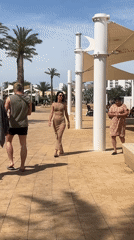 Tourists enjoy leisure activities at Dead Sea recreation sites